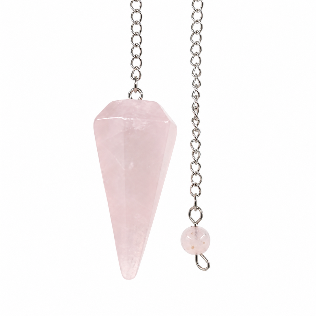 Close-up of a rose quartz pendulum against a white background